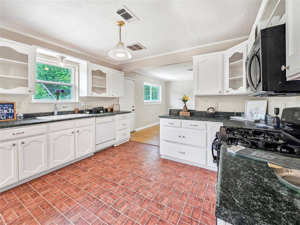 Open Kitchen and dining area with plenty of counterspace and storage