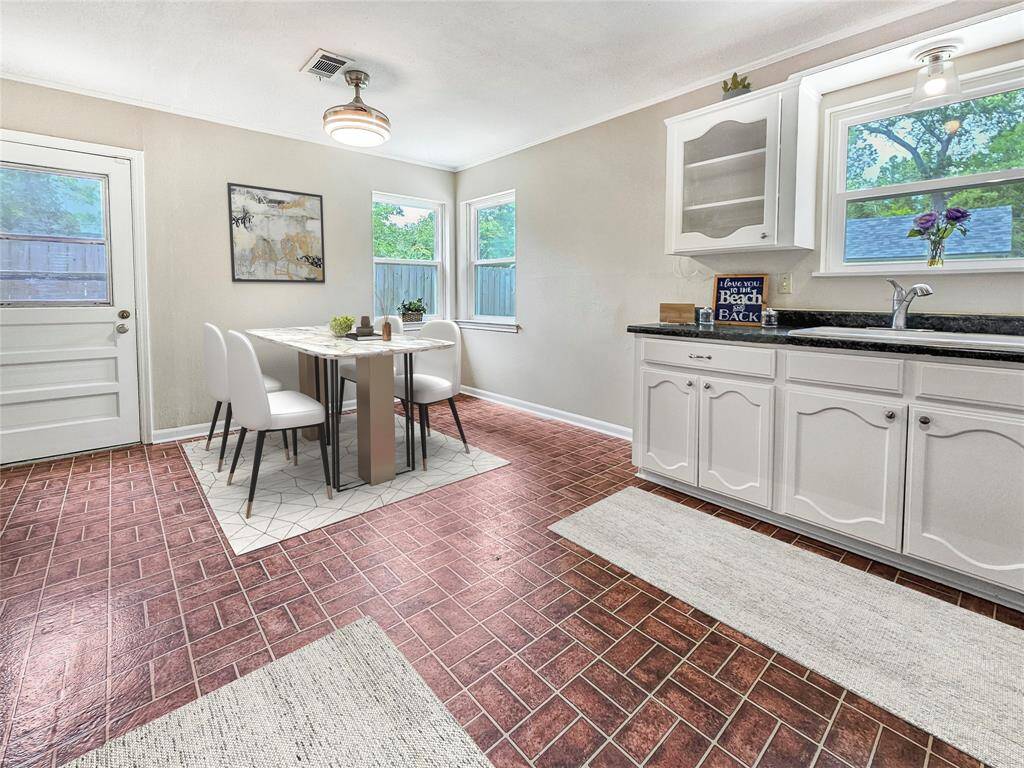 Open Kitchen and dining area with plenty of counterspace and storage - VIRTUALLY STAGED