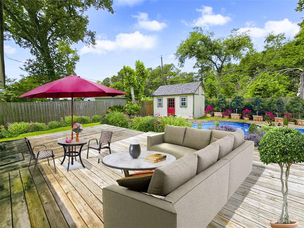 Exapnsive backyard patio/deck. So much space, so many possibilities! - VIRTUALLY STAGED