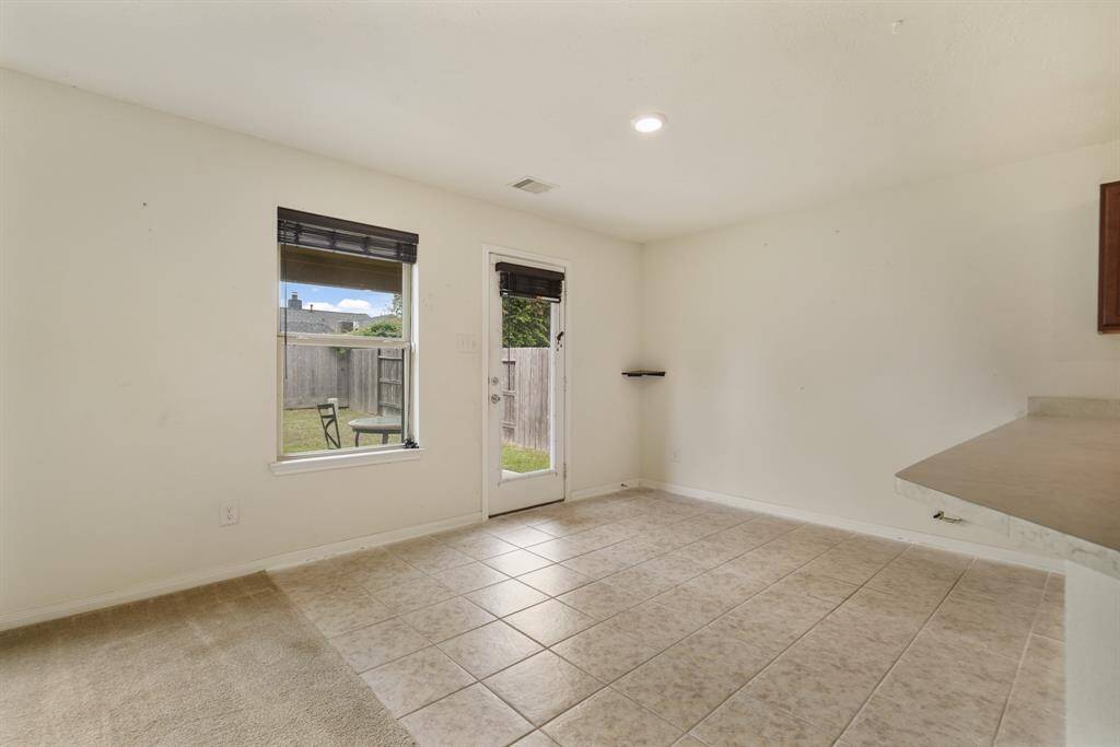 The dining area has great views into your backyard.