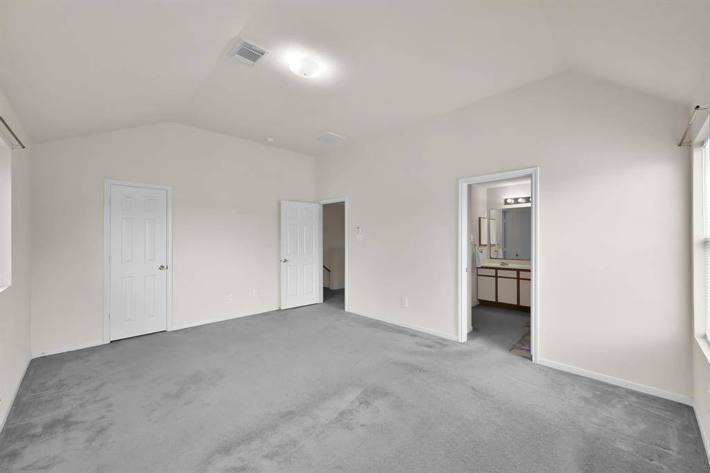 Primary bedroom has a huge walk in closet and ensuite bath