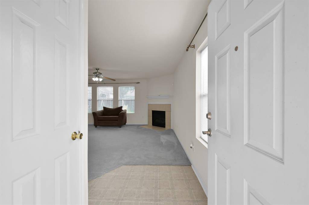Welcoming entrance opens to living room