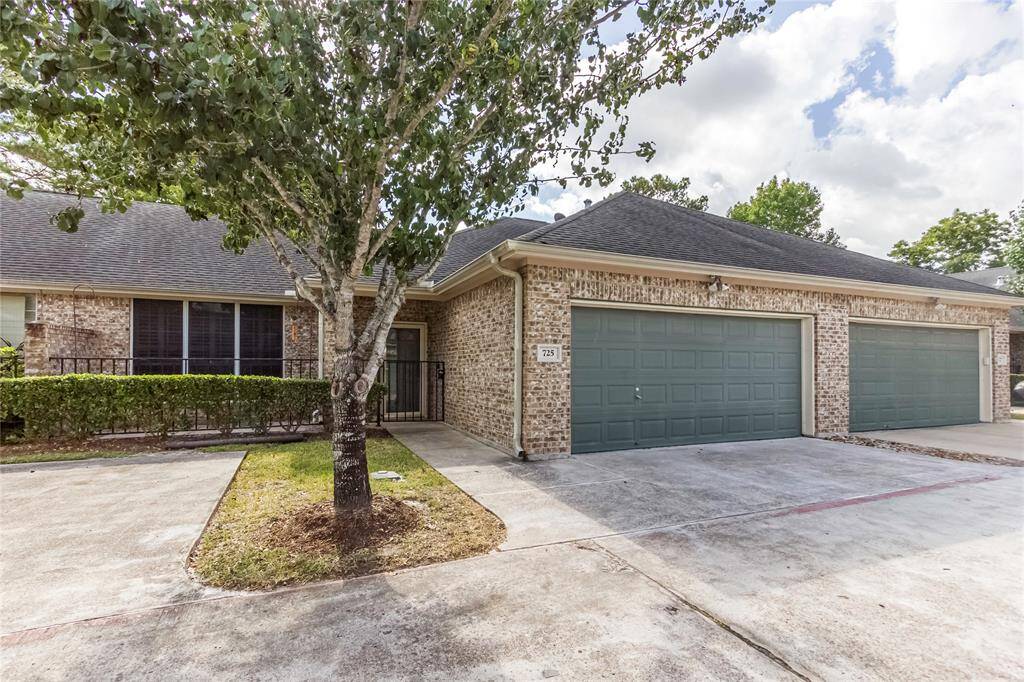 2 car garage and an assigned parking