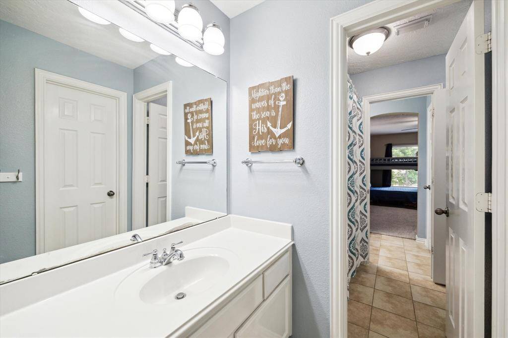 Jack and Jill bathroom connecting two of the secondary bedrooms