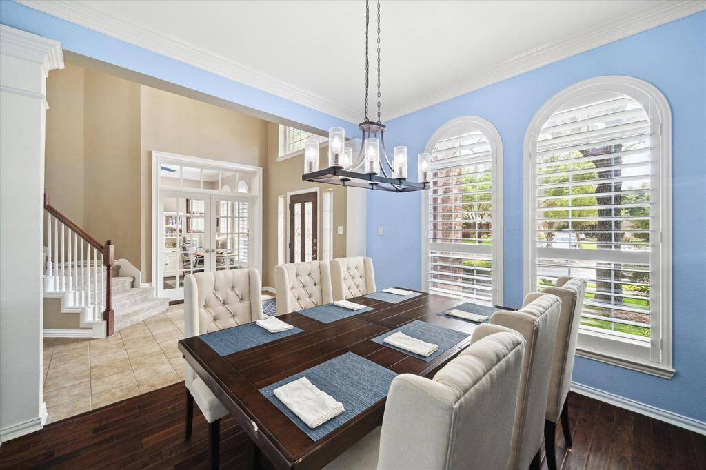 Refined setting with custom trim and chandelier centerpiece