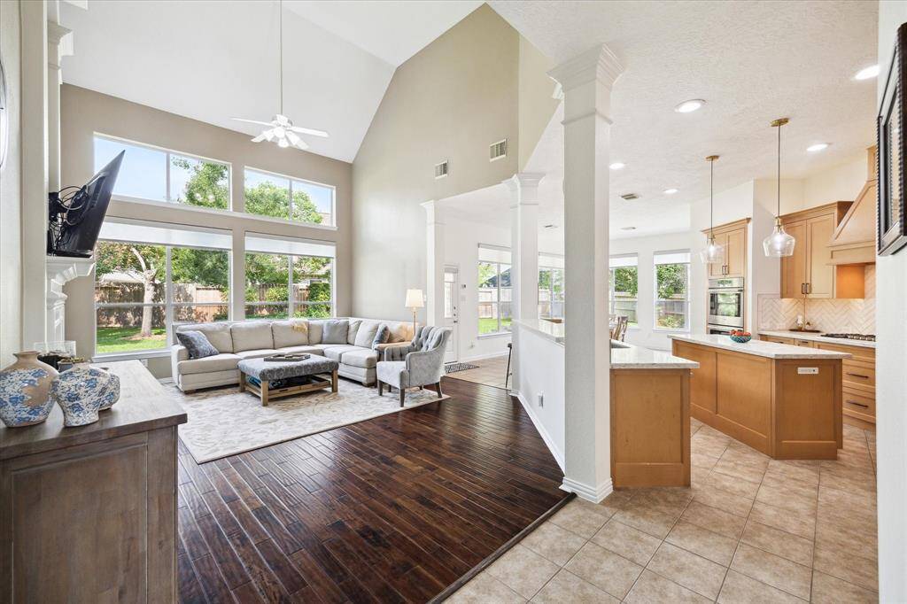 Spacious design with statement windows and rich flooring