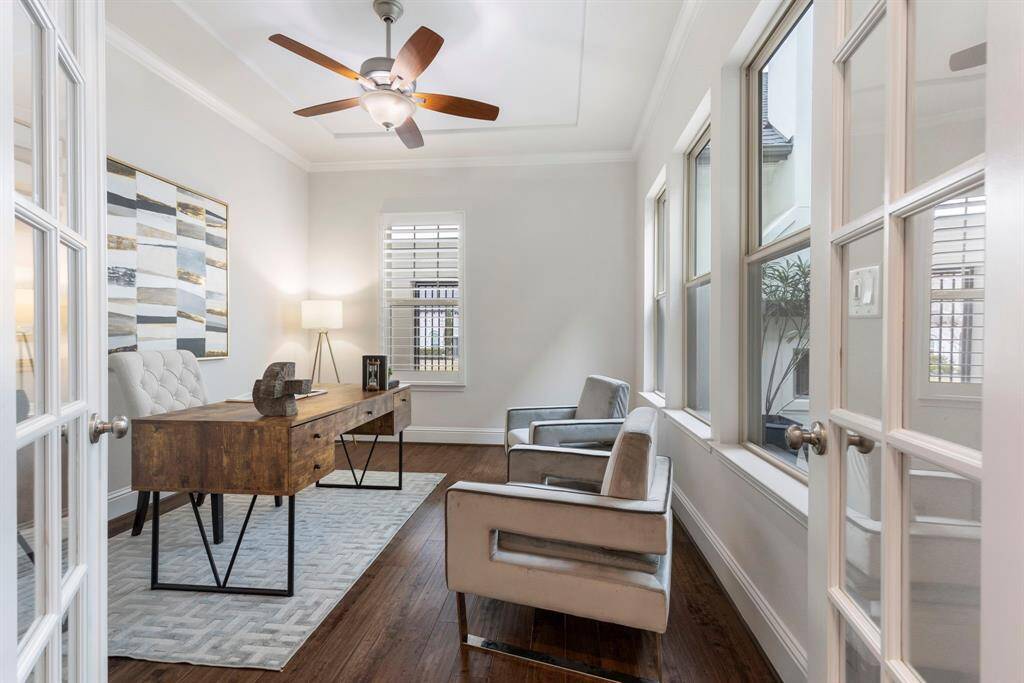Private office/study with French doors and wood floors carried throughout