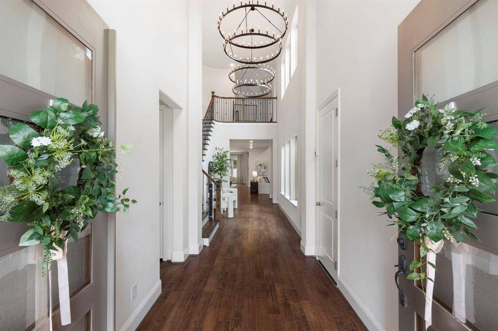 High ceiling entryway and foyer