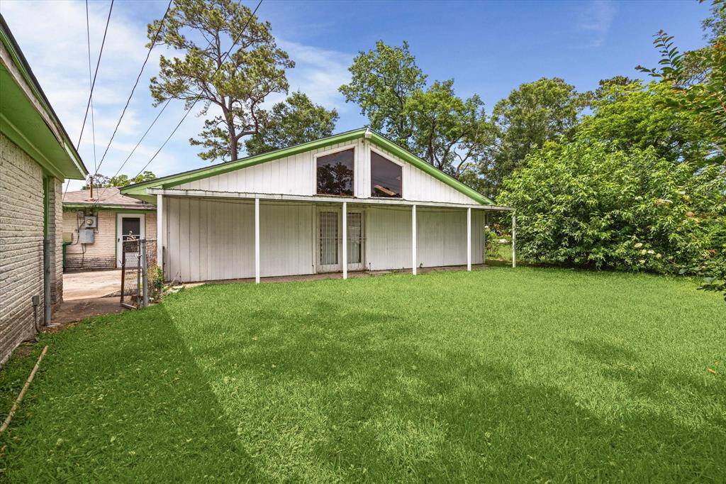 Fenced private backyard with mature landscaping
