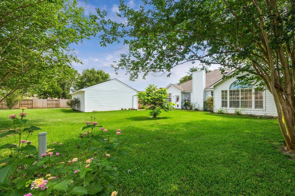 HUGE BACKYARD IS IDEAL FOR ENTERTAINING, GARDENING OR EVEN A FUTURE POOL.