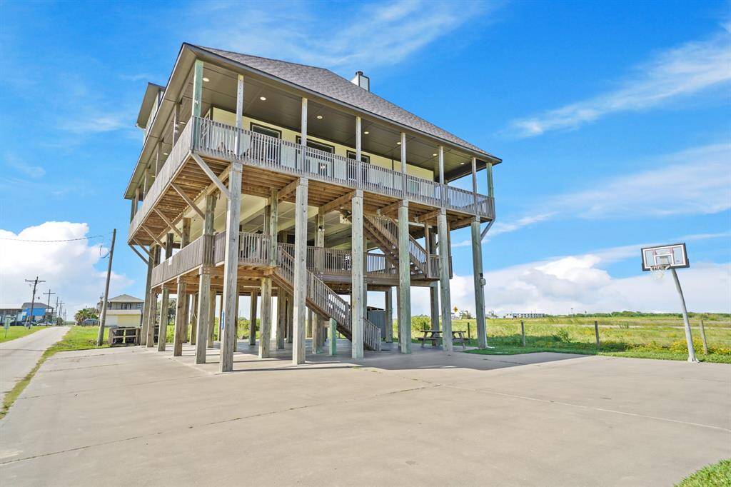 Soak in the sun or catch the evening breeze from the spacious wraparound decks on the main level.