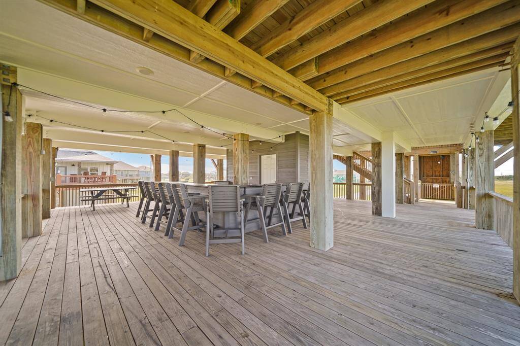 Sleek, durable countertops provide ample space for serving drinks, prepping food, or laying out a coastal buffet.