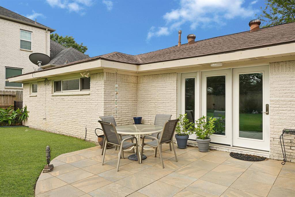 Imagine unwinding in the evenings on this spacious, tiled patio, overlooking a beautifully maintained and generously sized backyard.