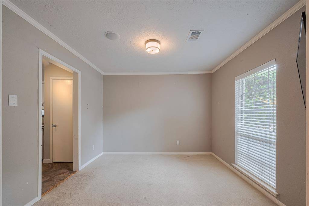 This space would make a great office, workout room, play room, or TV nook.