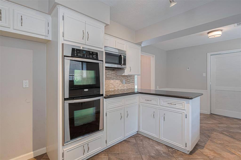 Enjoy double ovens and built-in microwave.