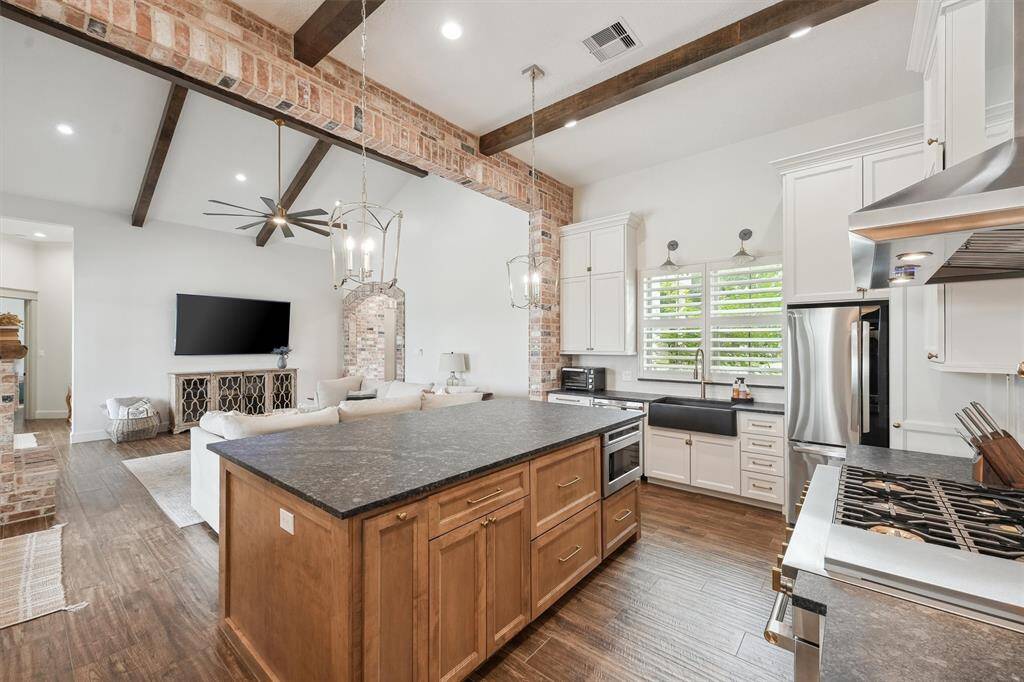 Truly open concept with kitchen open to living area.
