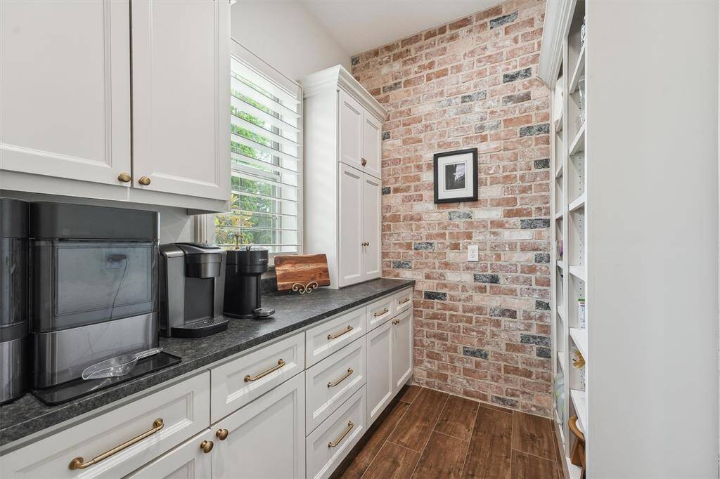 Walk in pantry with plenty of room for ice maker and coffee prep!
