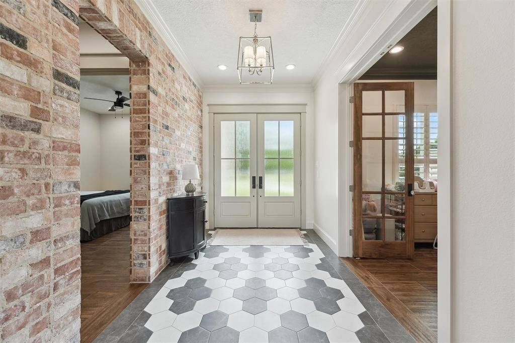 Elegant custom lighting throughout.