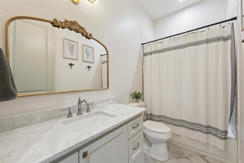 Full secondary bath downstairs.