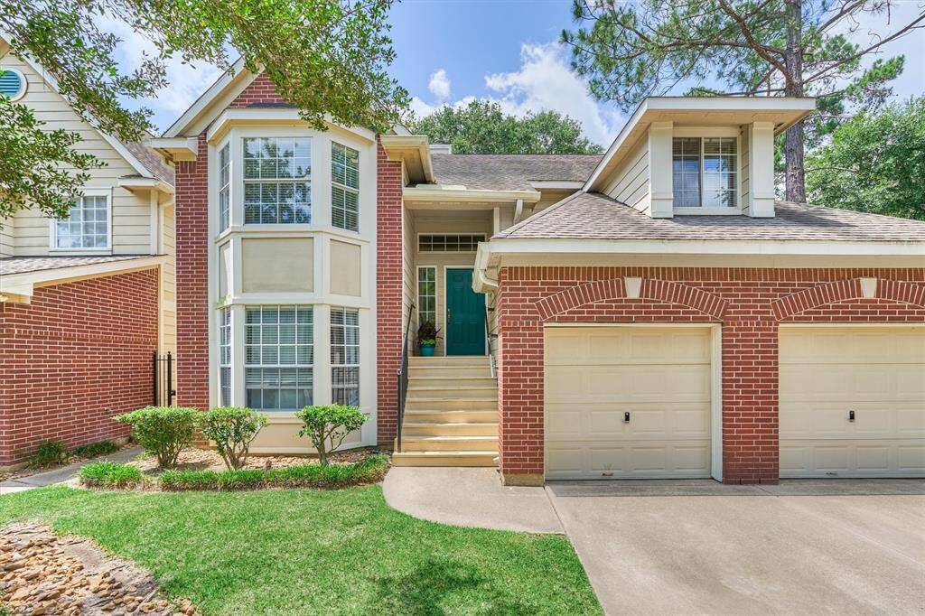 Charming Ryland condo tucked on greenbelt lot in Magnolia Pond features attractive curb appeal and thoughtful updates throughout!