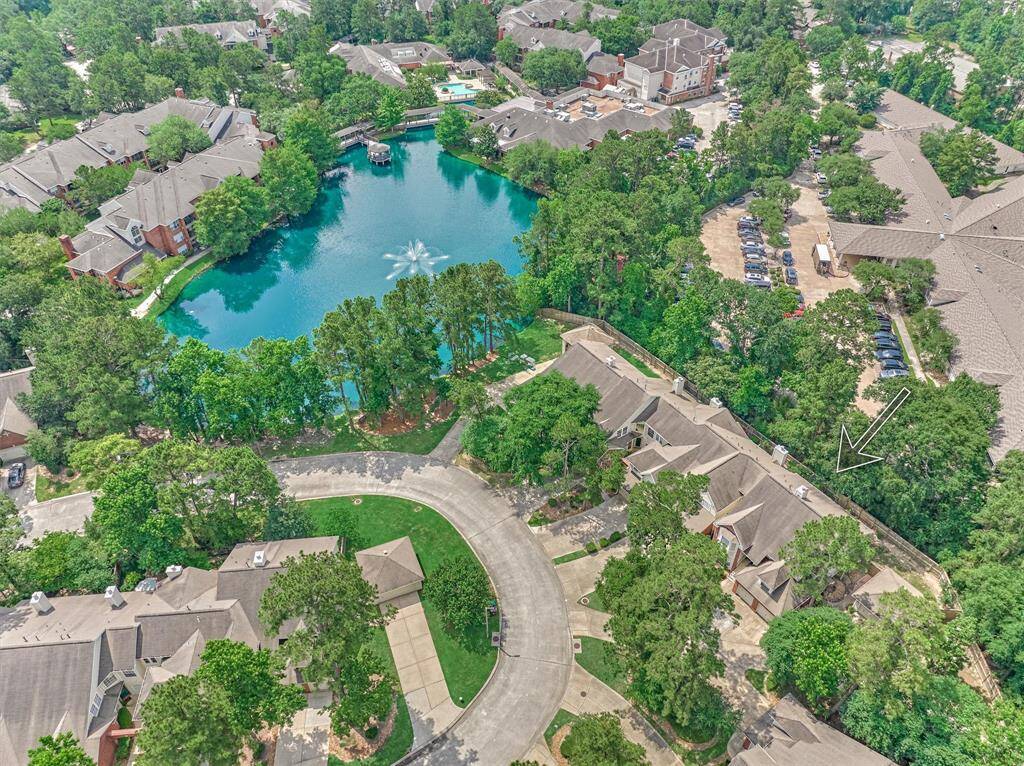 Aerial view showcases the classic Woodlands views...just steps to the community pond!