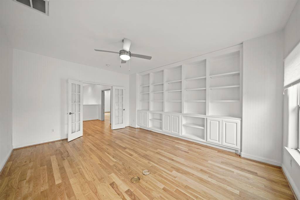 Double French Doors are positioned between the Gameroom and the Second Floor Bedroom Hallway.  The Gameroom adjoins an Ensuite Bath.