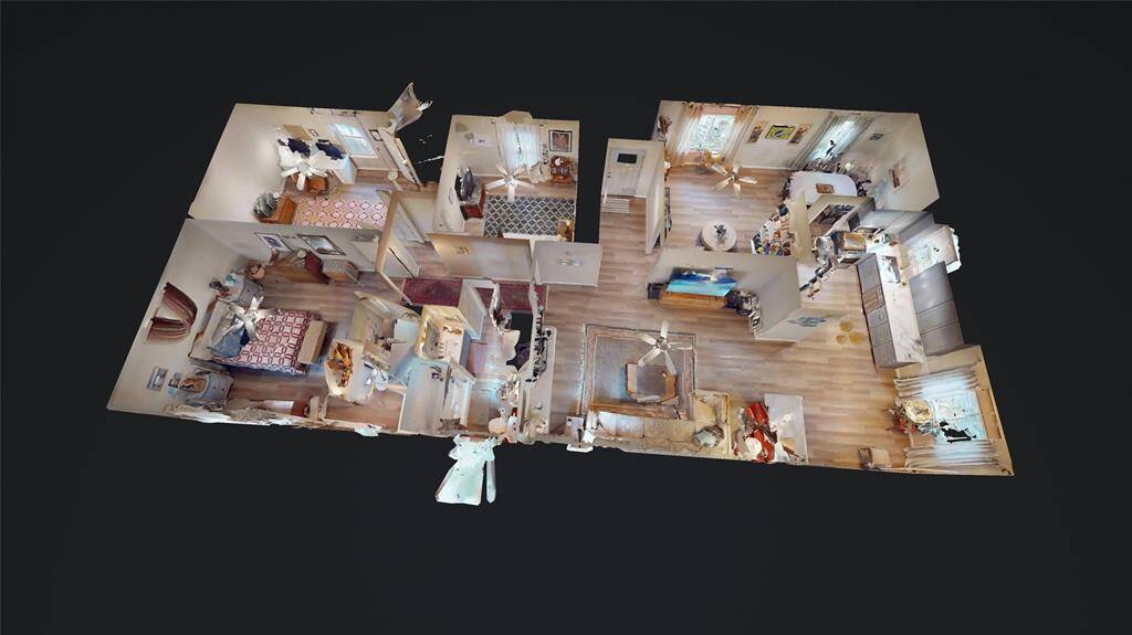 This is a detailed 3D floor plan showcasing a single-story home. It features multiple rooms, including a kitchen, living area, and several bedrooms and bathrooms, all connected by hallways. The layout is open and spacious, offering a clear view of room arrangements and furnishings.