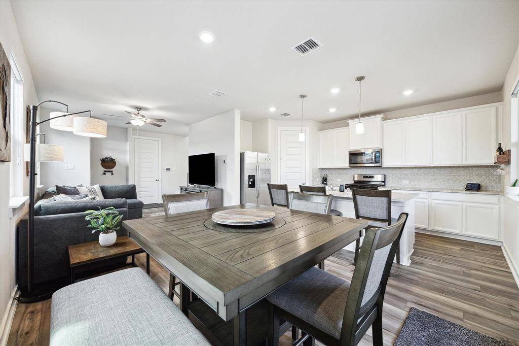 Additional view of breakfast, living and kitchen area.