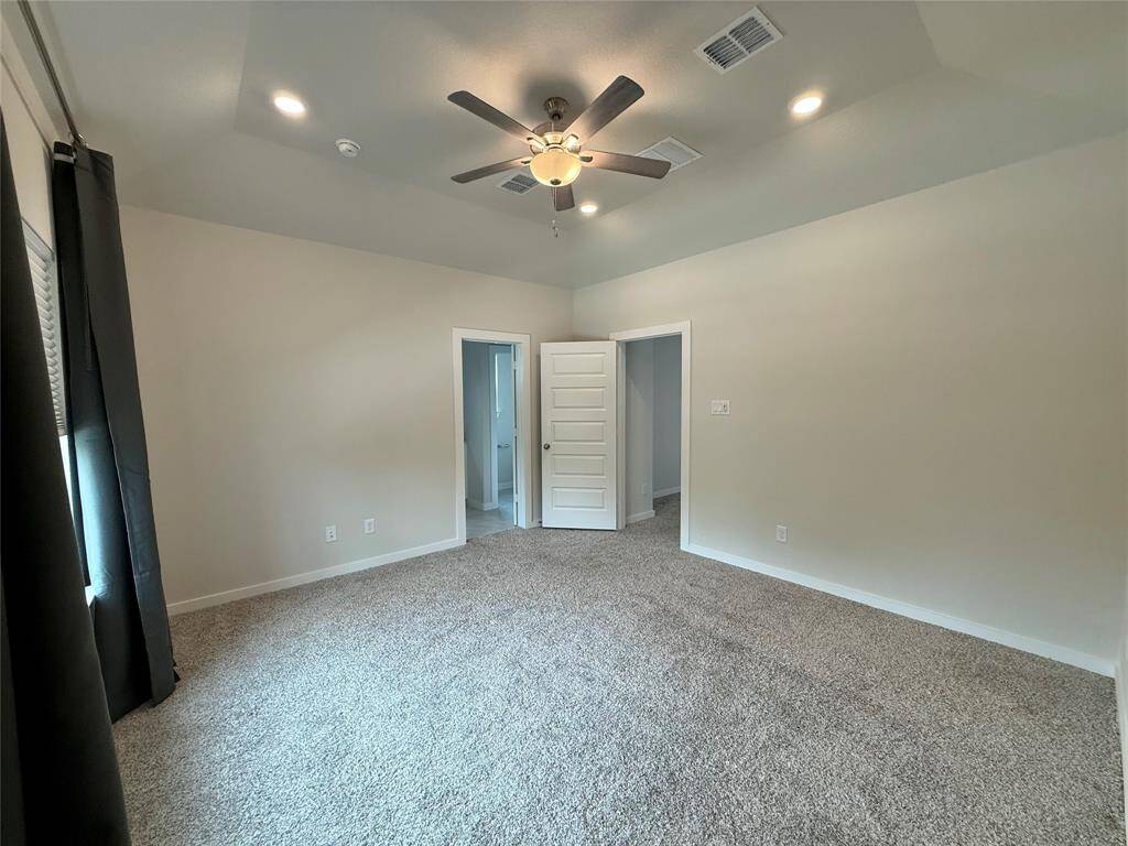 Additional view of the primary bedroom.