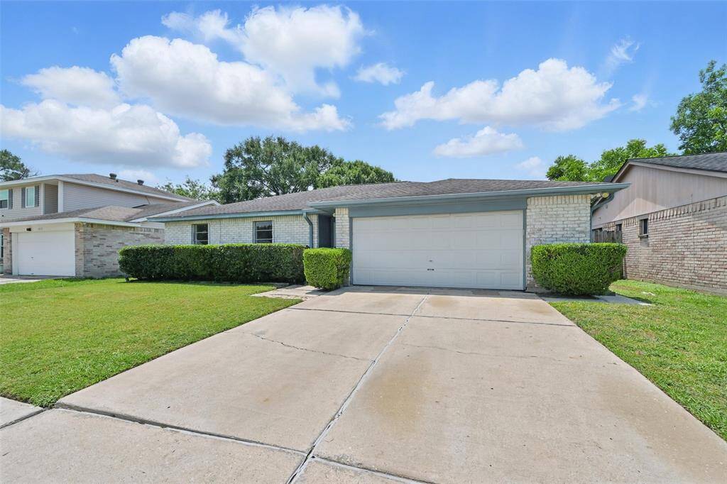 Spacious driveway provides ample room for parking
