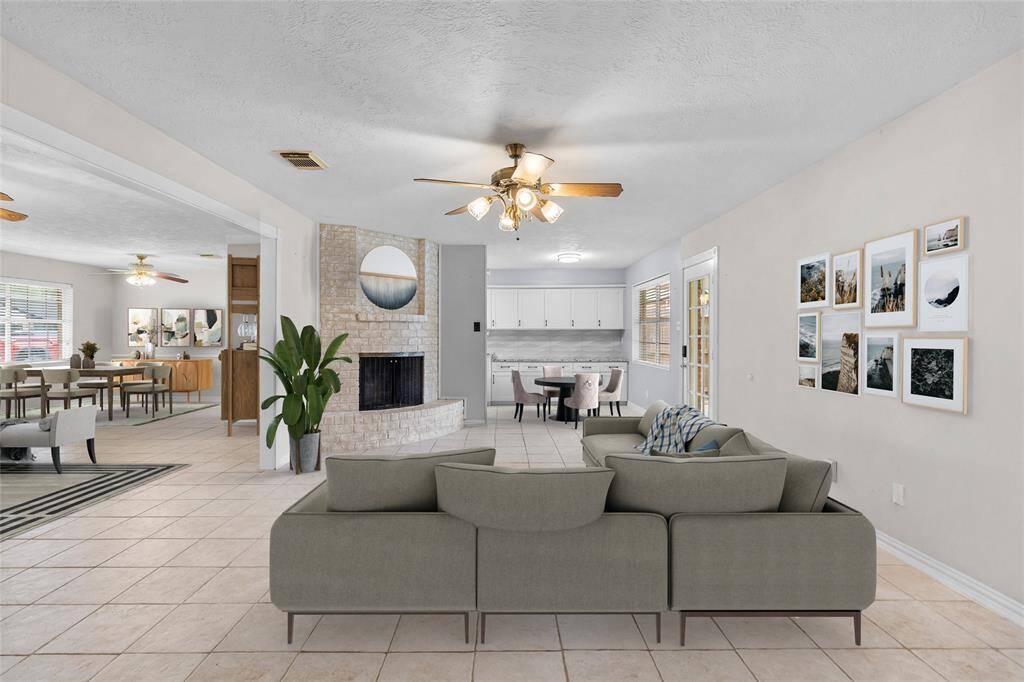 This fireplace-accented living room is the heart of the home. Whether you're entertaining family and guests or having a quiet evening watching TV, you'll love relaxing in this open and welcoming room.*Virtually Staged