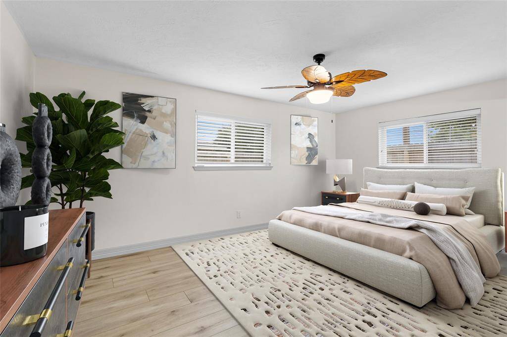 This primary bedroom sits at the back of  the home and is separated from the other bedrooms.*Virtually Staged
