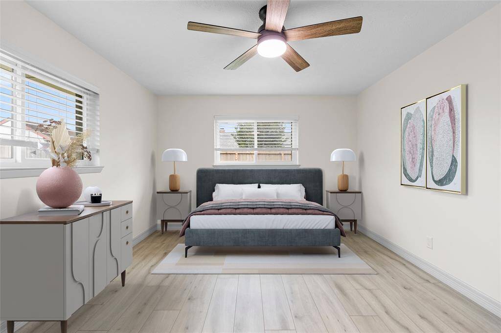 Bedroom 2. All bedrooms are equipped with ceiling fans to help keep those monthly costs down!*Virtually Staged