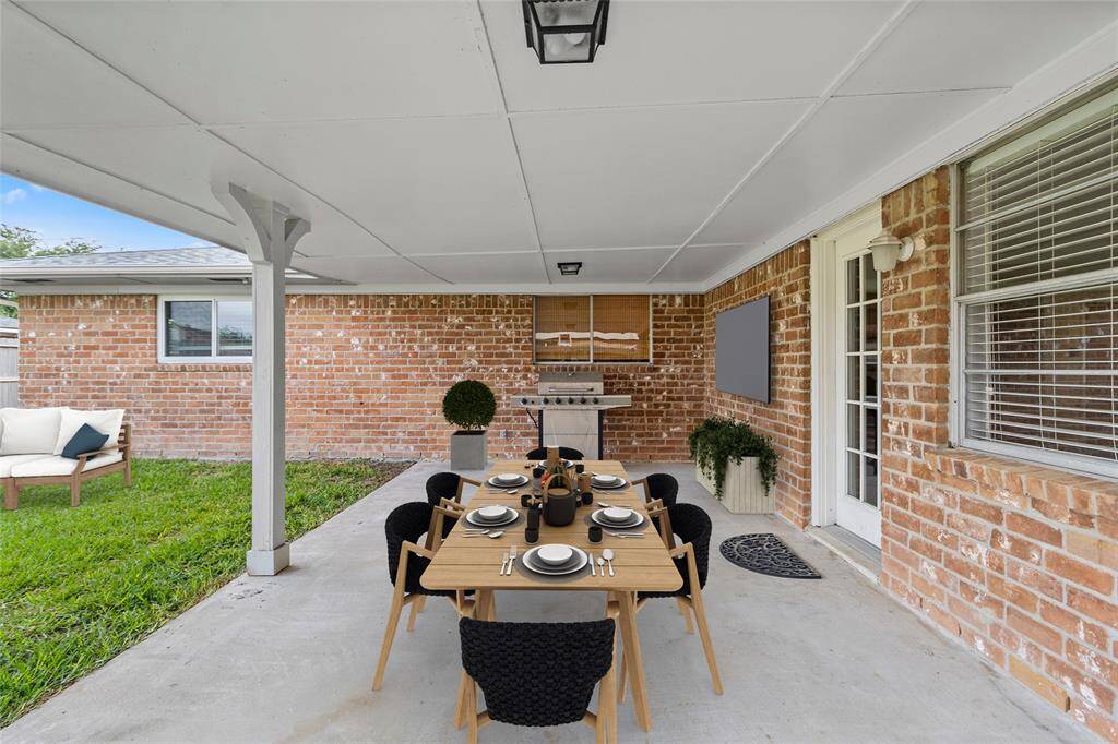 Heading out to the back, you'll enjoy a covered patio and a yard perfect for entertaining, pets, or simply relaxing in your private outdoor retreat.*Virtually Staged