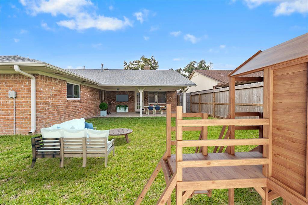 The back patio comes equipped with plentiful electric outlets for all your backyard accessories. The mounted security cameras come included with the home.*Virtually Staged
