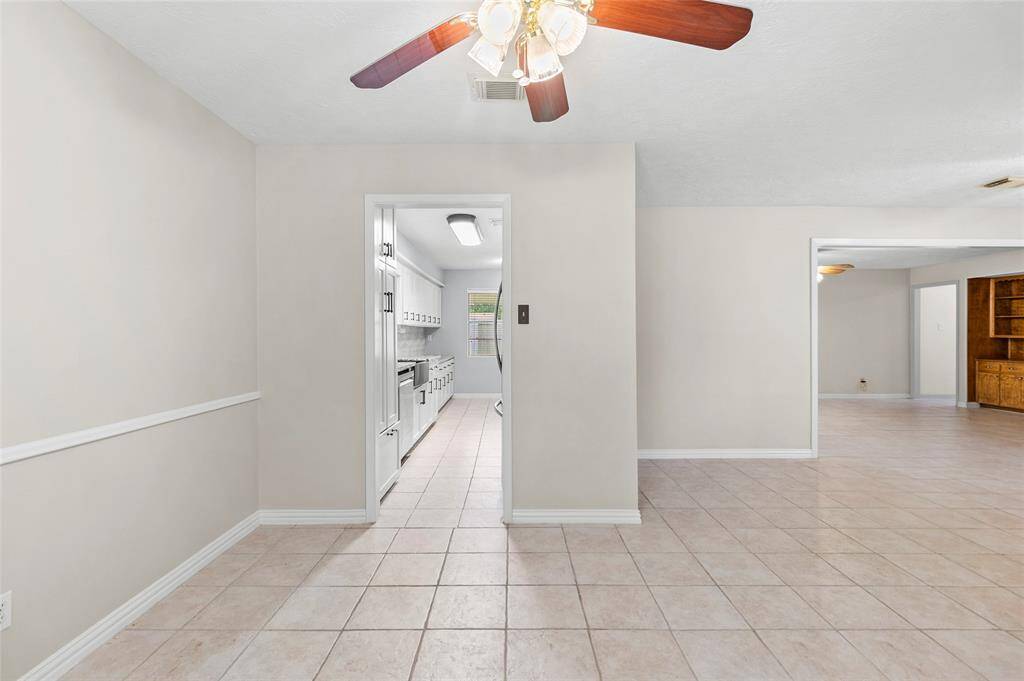 From this angle, you can see how open and connected this room is to the main living areas. Perfectly placed near the kitchen, this breakfast / dining space makes hosting family dinners or holidays a breeze.