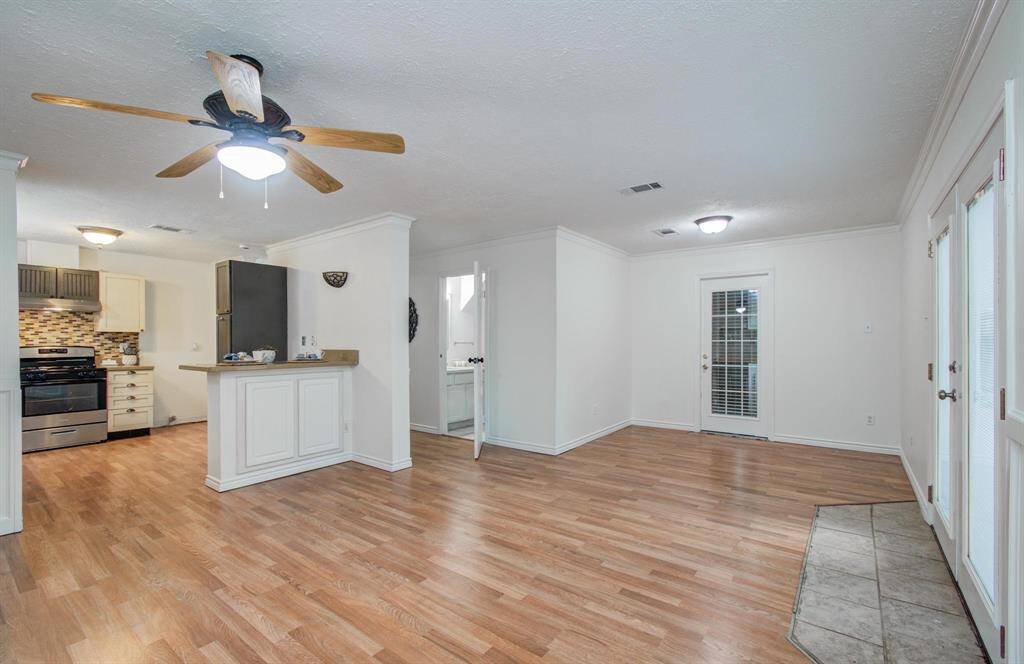 Plenty of room for entertaining friends. Half bath/laundry room combo located off the entry hallway.