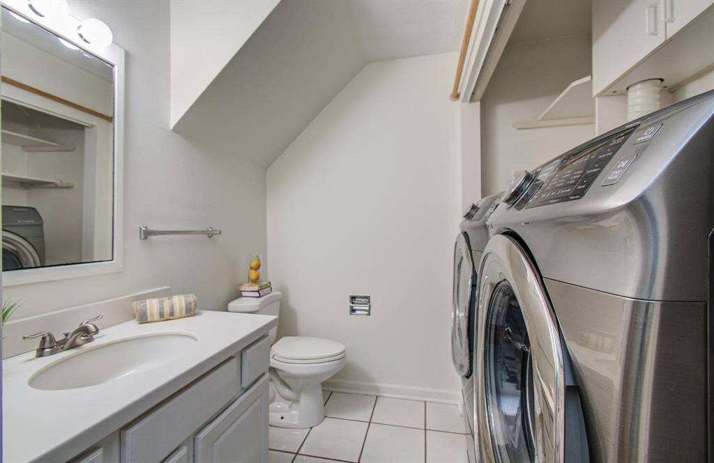 Washer and dryer included in the sale.