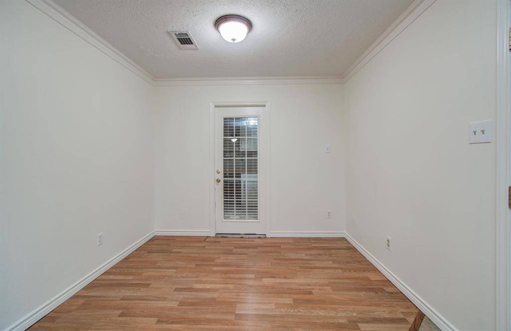 Entry to bonus room leading to garage.