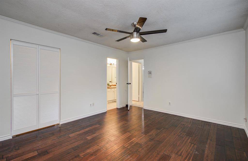 Walk-in closet in the primary bedroom.