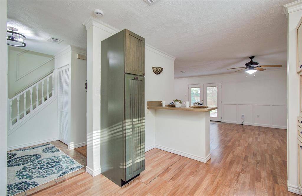 Kitchen open to the spacious living room.