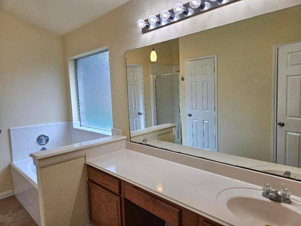 Master Bath with Garden Tub & Separate Shower.
