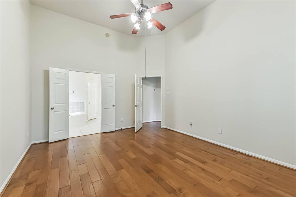 Another view of the primary bedroom.