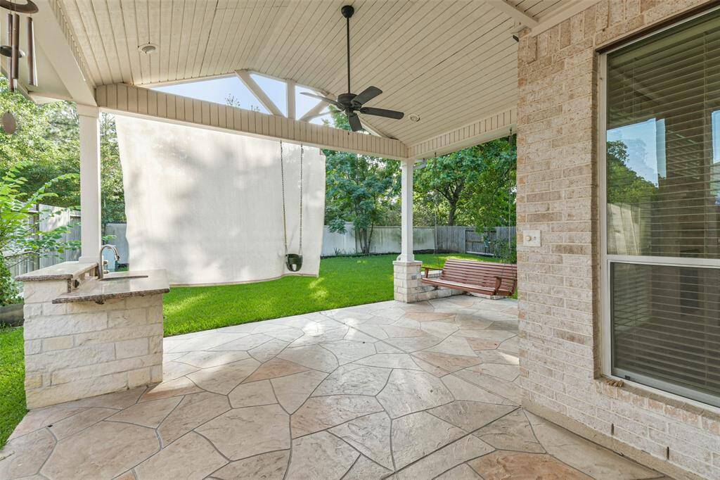 Step outside the back door and enjoy your large, covered patio.