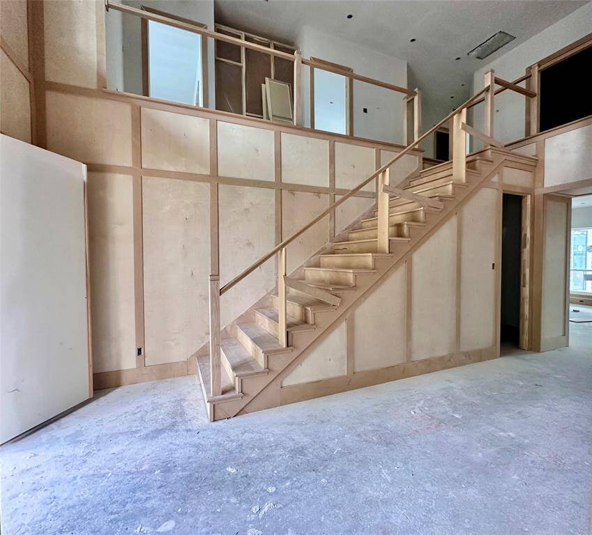 Foyer - view of staircase and future location of the custom wine cabinet