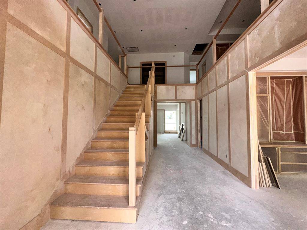 Foyer - full of light and under construction -- doorway to study is to the right