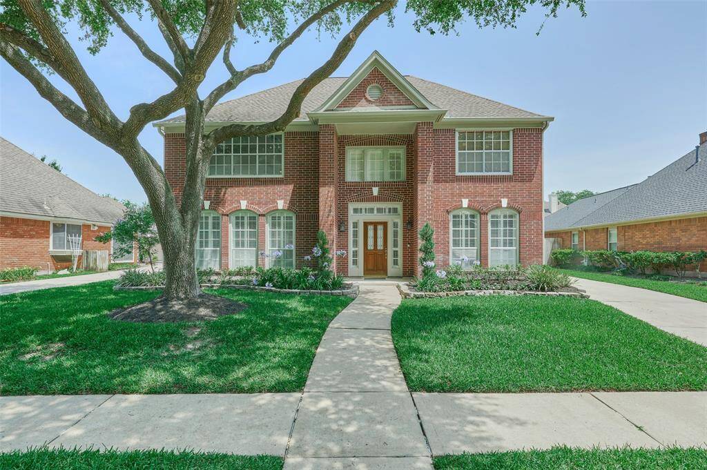 This home boasts 3,153 SF with an excellent use of space. There are plantation shutters across the lower level front of the home.