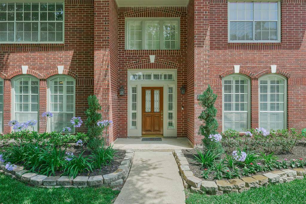 The home is nicely landscaped for that great first impression curb appeal.