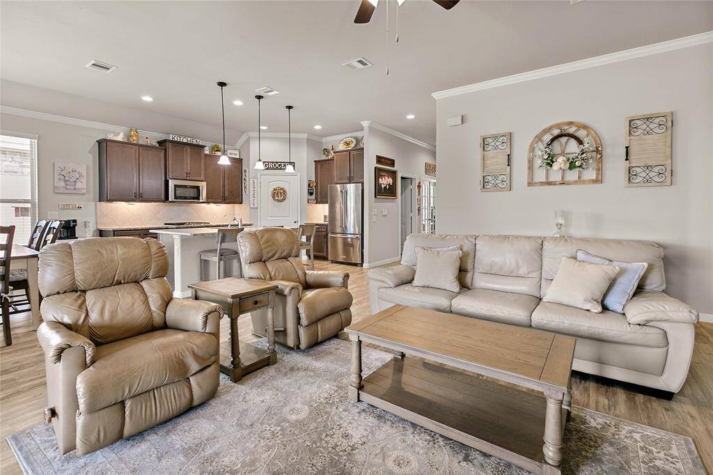 This photo showcases the open-concept living area.