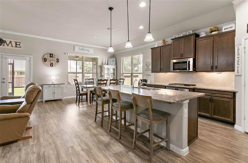 Enjoy the ease of entertaining and staying connected with everyone while cooking in the kitchen.
